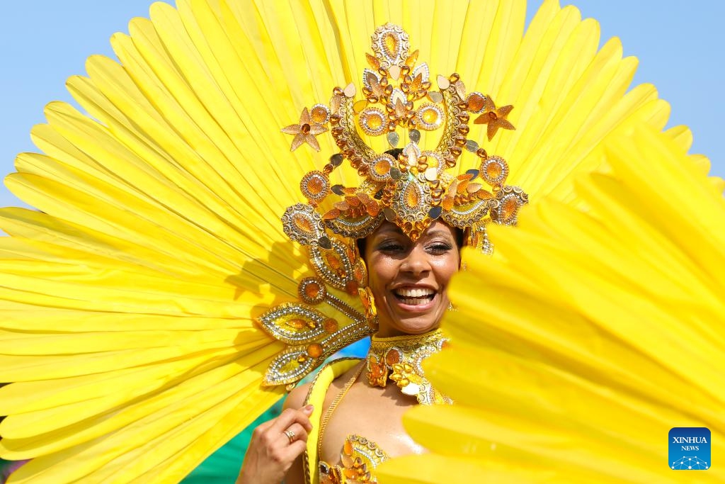 A performer participates in Notting Hill Carnival in London, Britain, on Aug. 26, 2024. Originated in the 1960s, the carnival is a way for Afro-Caribbean communities to celebrate their cultures and traditions. (Photo: Xinhua)