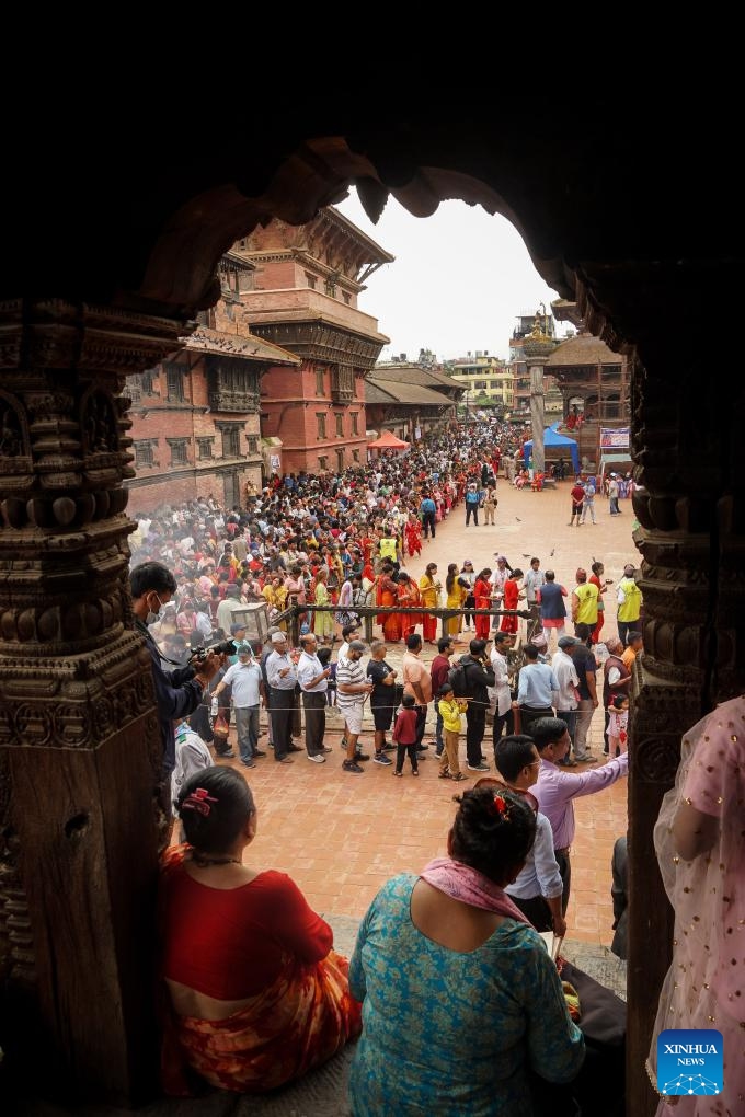 Devotees line up to worship Lord Krishna at a Krishna temple during the Krishna Janmashtami festival in Lalitpur, Nepal, Aug. 26, 2024. Krishna Janmashtami festival is celebrated annually to mark the birth anniversary of Hindu God Krishna. (Photo: Xinhua)