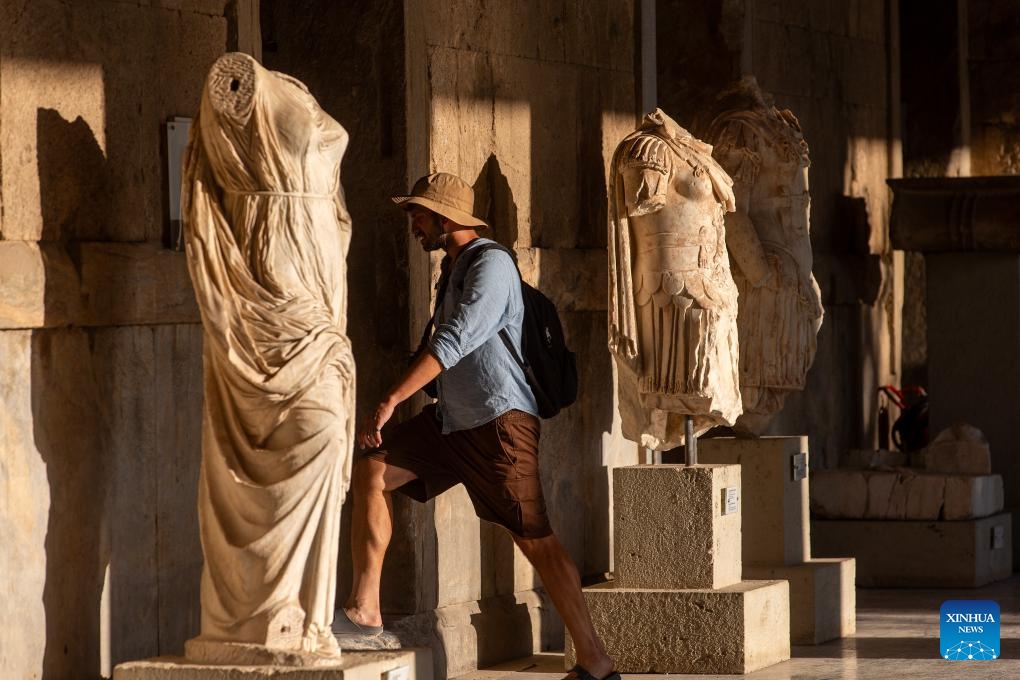 A man visits the archaeological site at the ancient Agora of Athens in Athens, Greece, on Aug. 27, 2024. Greek tourism revenue surged by 12.2 percent in the first half of 2024 year-on-year to reach 6.921 billion euros (7.75 billion U.S. dollars), according to recent data from the Bank of Greece. (Photo: Xinhua)