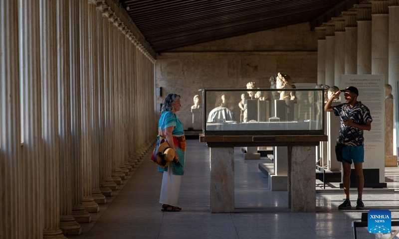 Tourists visit the archaeological site at the ancient Agora of Athens in Athens, Greece, on Aug. 27, 2024. Greek tourism revenue surged by 12.2 percent in the first half of 2024 year-on-year to reach 6.921 billion euros (7.75 billion U.S. dollars), according to recent data from the Bank of Greece. (Photo: Xinhua)