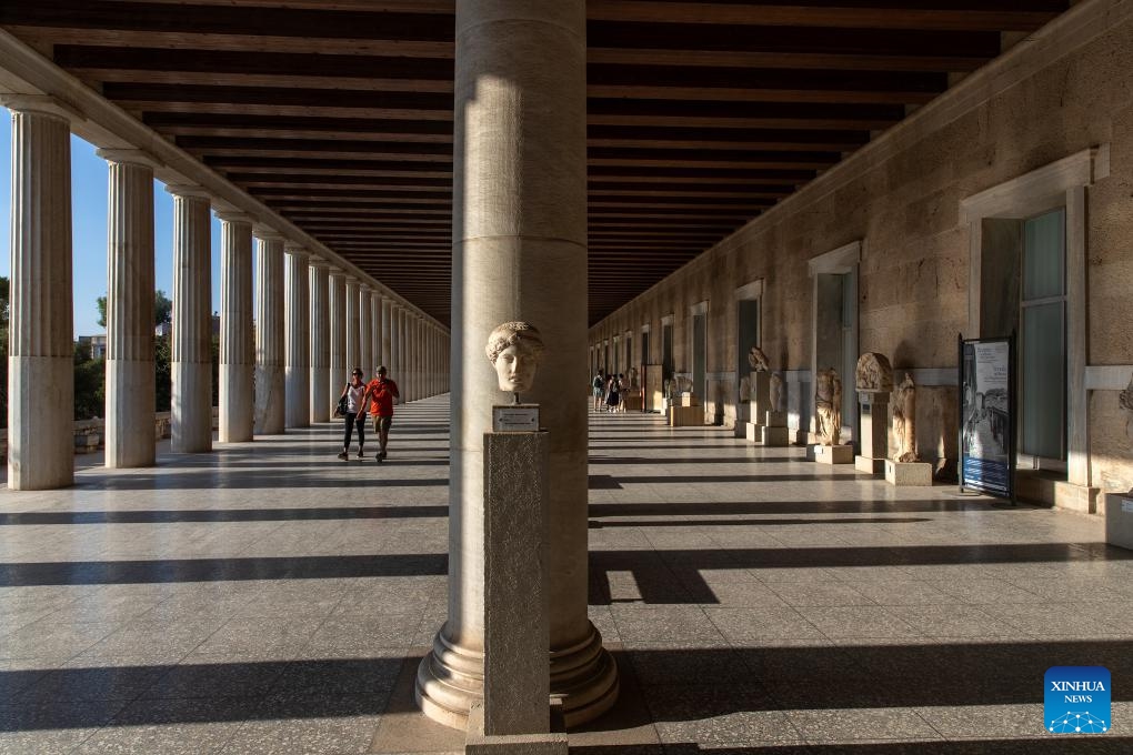 Tourists visit the archaeological site at the ancient Agora of Athens in Athens, Greece, on Aug. 27, 2024. Greek tourism revenue surged by 12.2 percent in the first half of 2024 year-on-year to reach 6.921 billion euros (7.75 billion U.S. dollars), according to recent data from the Bank of Greece. (Photo: Xinhua)