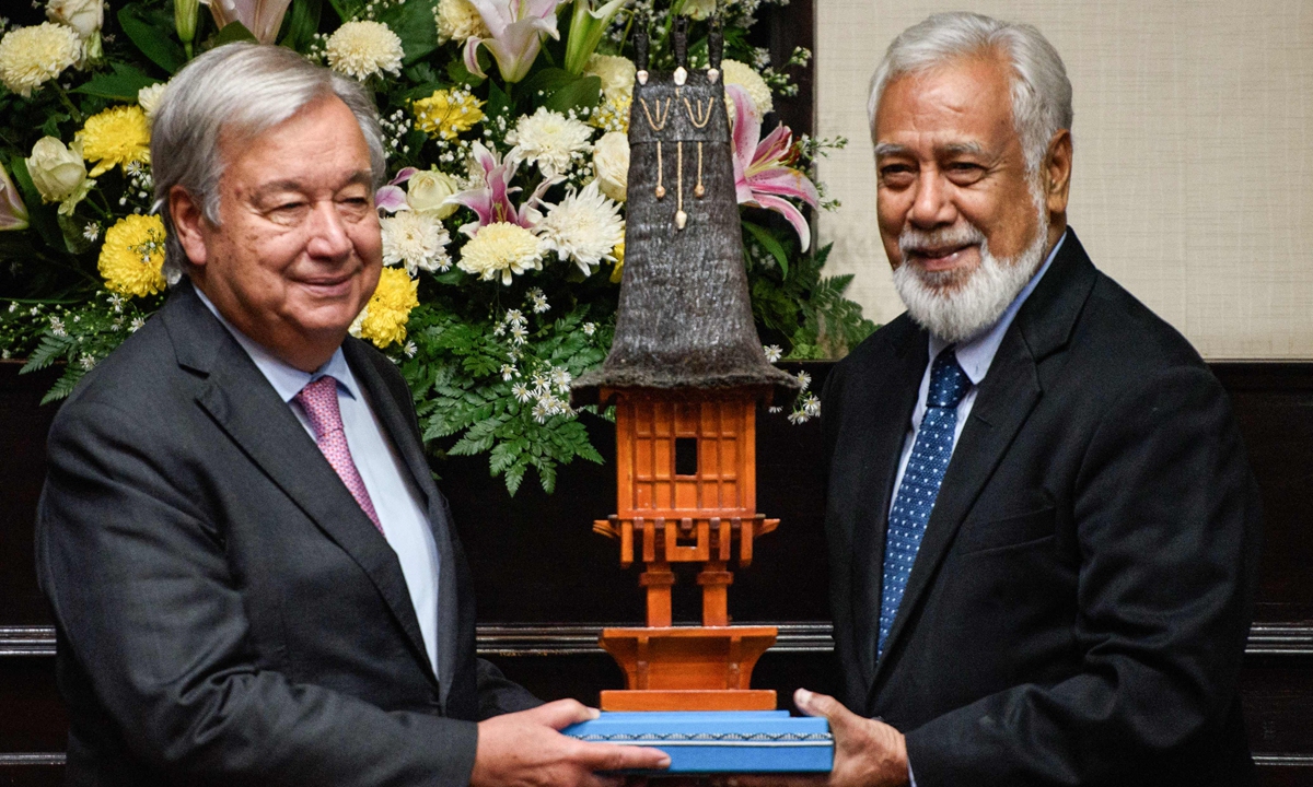 UN Secretary-General Antonio Guterres (left) poses with Timorese Prime Minister Xanana Gusmao during his visit at the Government Palace in Dili on August 29, 2024. Guterres received a warm welcome in the capital of Timor-Leste the previous day, when he hailed the 25th anniversary of its vote for independence. Guterres praised the country's unity of the past, and pledged the UN's unwavering support in the future. Photo: VCG