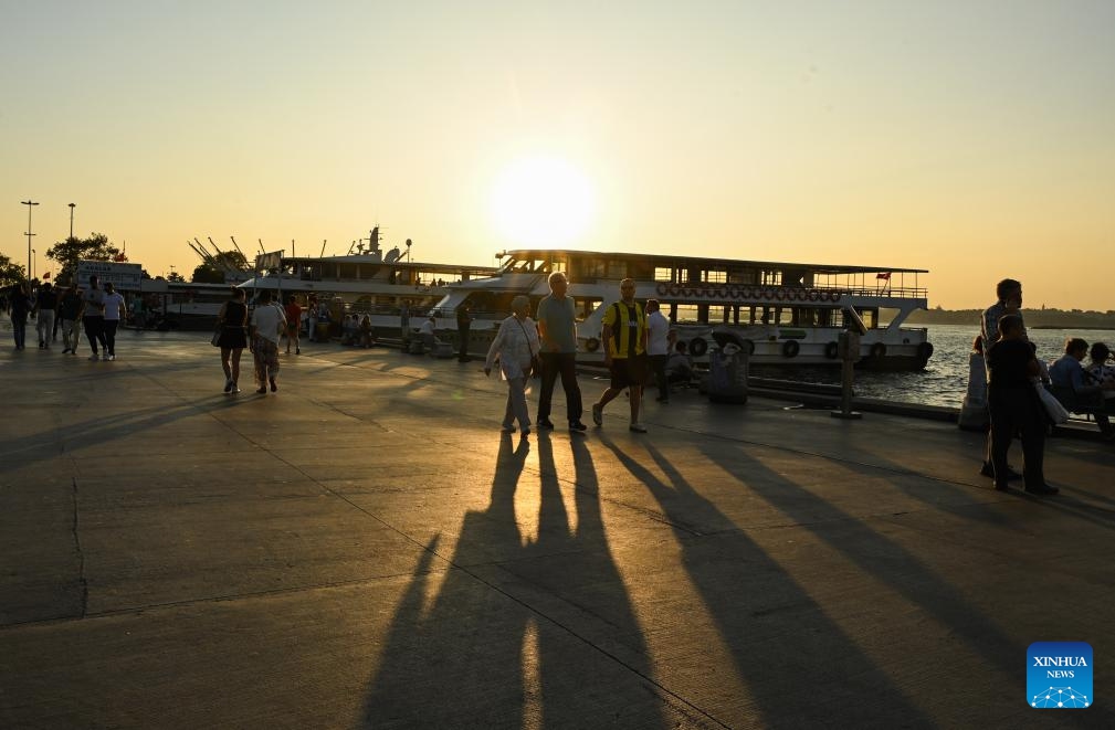 People walk along the Bosphorus Strait in Istanbul, Türkiye, Aug. 27, 2024. (Photo: Xinhua)