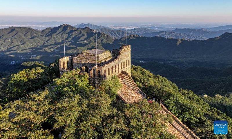 An aerial drone photo taken on Aug. 27, 2024 shows the Jiuyanlou and Jiankou sections of the Great Wall in Beijing, capital of China. (Photo: Xinhua)