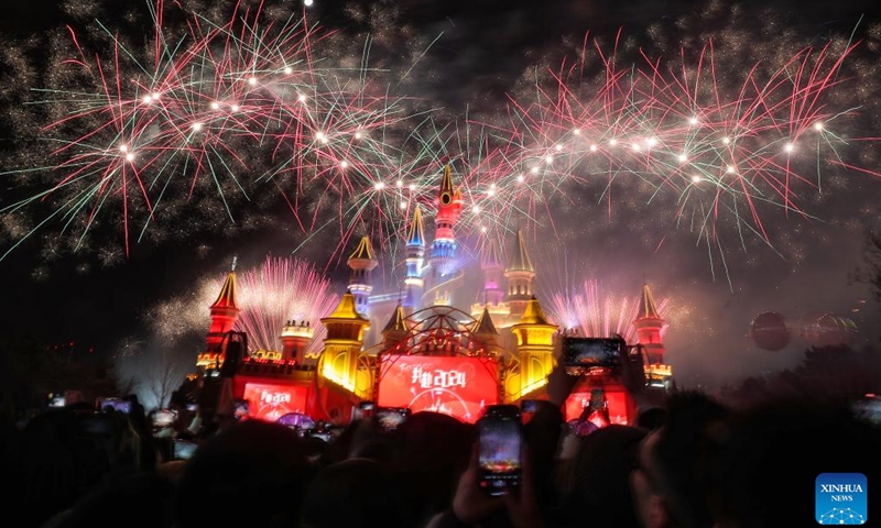 This photo taken on Jan. 1, 2024 shows fireworks above the Fantawild Adventure in Shenyang, northeast China's Liaoning Province. In recent years, while the booming night economy in China's northeast region is providing local people and tourists with colorful nightlife options, it has given impetus to the growth of local economy. (Photo: Xinhua)