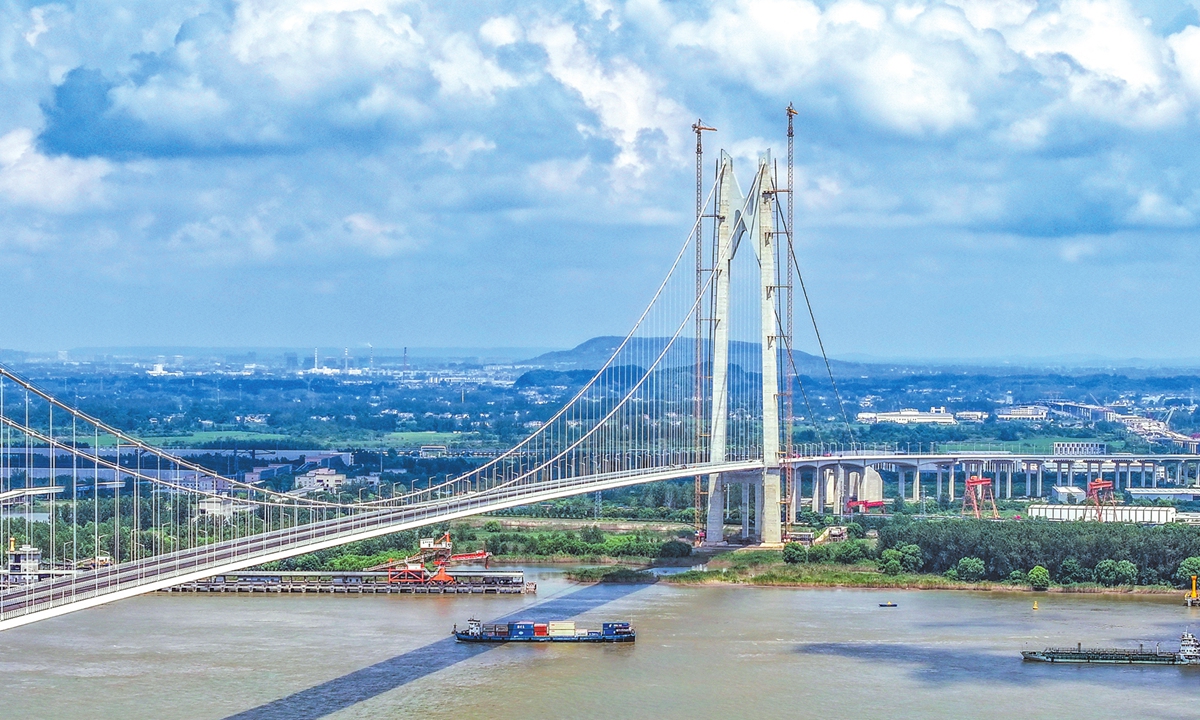 An aerial photo shows a long-span suspension bridge on the Yangtze River under construction in Nanjing, East China's Jiangsu Province on August 29, 2024. The main span of the bridge is 1,760 meters long and the main tower is 263.8 meters high. Photo: cnsphoto