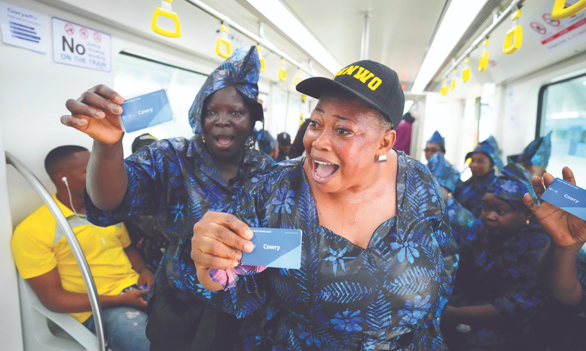 People sing as the ride on a new Lagos Blue Line train service built by China Civil Engineering Construction Corporation in Lagos, Nigeria, Monday, September 4, 2023. Photo: VCG