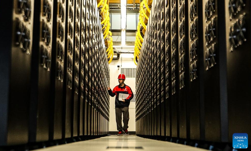 A staff member works in the data room of a supercomputing center in Gui'an New Area, southwest China's Guizhou Province, Aug. 29, 2024. Often dubbed China's big-data hub, the mountainous province of Guizhou is China's first national big-data comprehensive pilot zone. It promotes the big-data industry as the backbone of its high-quality social and economic development. Currently, 47 major data centers are either under construction or operational across this province. (Xinhua/Liu Xu)