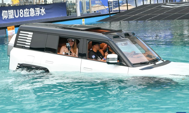 A Yangwang U8 SUV goes through emergency floating test during Chengdu Motor Show 2024 in Chengdu, southwest China's Sichuan Province, Aug. 30, 2024. The Chengdu Motor Show 2024 kicked off here on Friday. Nearly 130 Chinese and foreign car companies made appearance during the motor show, with more than 1,600 vehicles on display. (Xinhua/Tang Wenhao)