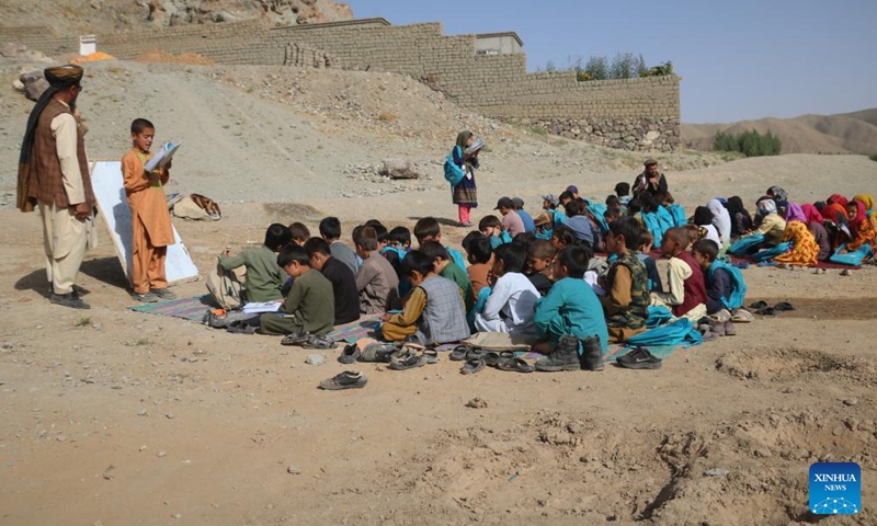 Children attend an open-air class in Firoz Koh, Ghor province, Afghanistan, Aug. 31, 2024. Students in the Sheikhha area of Firoz Koh continue their studies despite challenging conditions after a huge flood in May. Photo: Xinhua