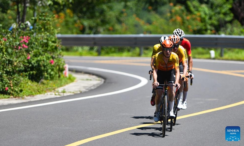 Cyclists compete during Stage 5 of the 15th Tour of Hainan Island cycling race from Changjiang to Sanya, south China's Hainan Province, Aug. 31, 2024. Photo: Xinhua