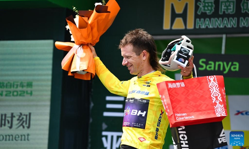 New Zealand's Aaron Murray Gate of Burgos-BH celebrates in the yellow jersey after Stage 5 of the 15th Tour of Hainan Island cycling race from Changjiang to Sanya, south China's Hainan Province, Aug. 31, 2024. Photo: Xinhua