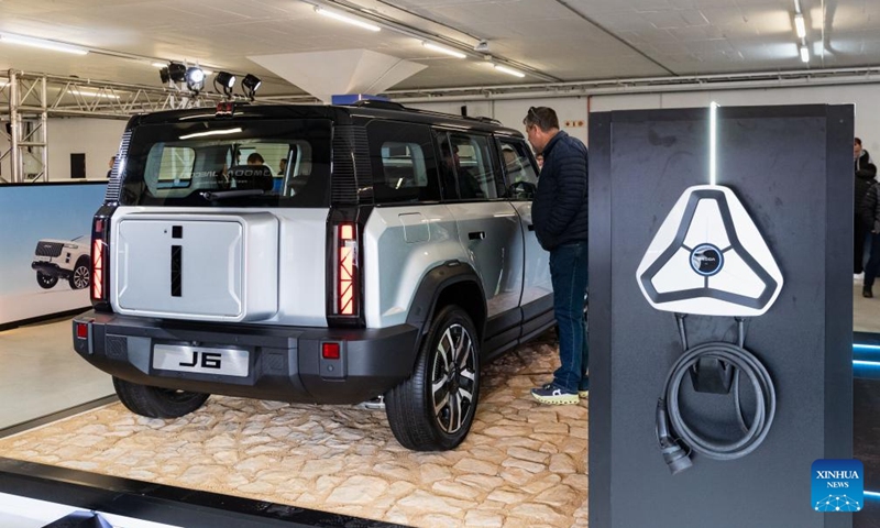 A visitor views an electric vehicle of Chery from China during the Festival of Motoring in Johannesburg, South Africa, Aug. 30, 2024. This event is held here from Aug. 30 to Sept. 1. Photo: Xinhua