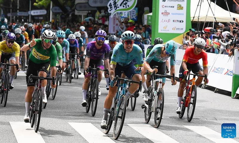 Russia's Ivan Smirnov (front) of Astana Qazaqstan Team celebrates after crossing the finish line during Stage 5 of the 15th Tour of Hainan Island cycling race from Changjiang to Sanya, south China's Hainan Province, Aug. 31, 2024. Photo: Xinhua