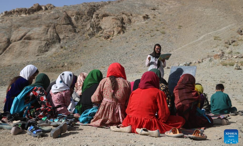 Children attend an open-air class in Firoz Koh, Ghor province, Afghanistan, Aug. 31, 2024. Students in the Sheikhha area of Firoz Koh continue their studies despite challenging conditions after a huge flood in May. Photo: Xinhua