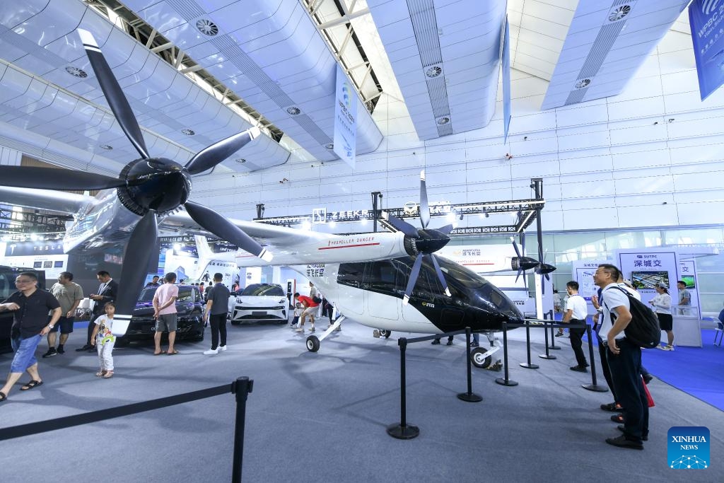 Visitors look at an electric vertical take-off and landing aircraft in Yibin, southwest China's Sichuan Province, Sept. 2, 2024. (Photo: Xinhua)