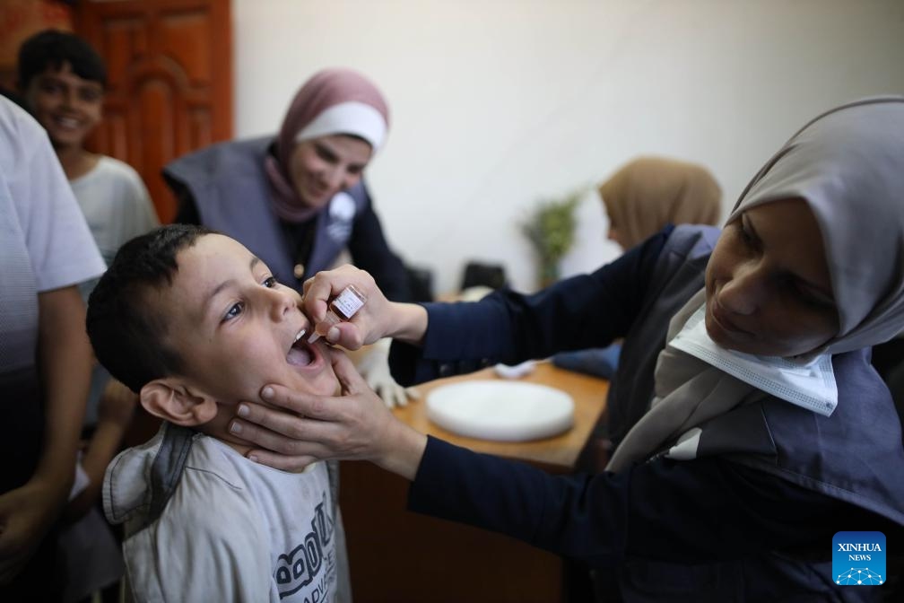 A boy receives a dose of the polio vaccine in the Al-Maghazi refugee camp, central Gaza Strip, on Sept. 2, 2024. Initial reporting shows over 86,000 children in the central Gaza Strip received a polio vaccine on Sunday, the first day of the polio campaign in the coastal enclave, Director-General of the World Health Organization Tedros Adhanom Ghebreyesus said on social media platform X on Monday. (Photo: Xinhua)