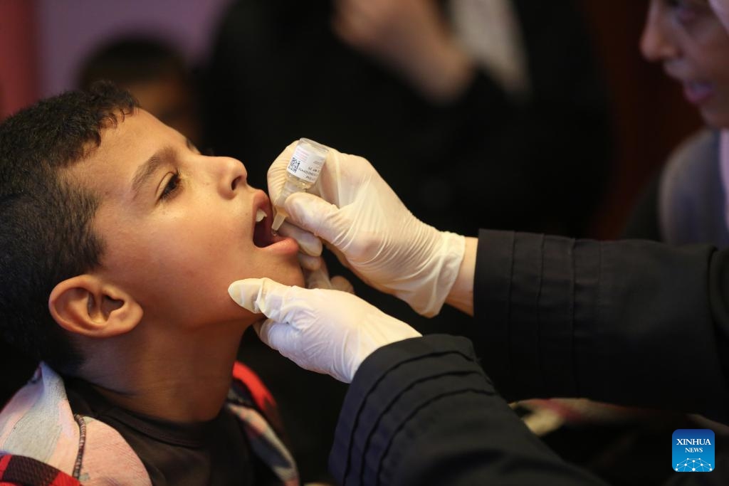 A boy receives a dose of the polio vaccine in the Al-Maghazi refugee camp, central Gaza Strip, on Sept. 2, 2024. Initial reporting shows over 86,000 children in the central Gaza Strip received a polio vaccine on Sunday, the first day of the polio campaign in the coastal enclave, Director-General of the World Health Organization Tedros Adhanom Ghebreyesus said on social media platform X on Monday. (Photo: Xinhua)