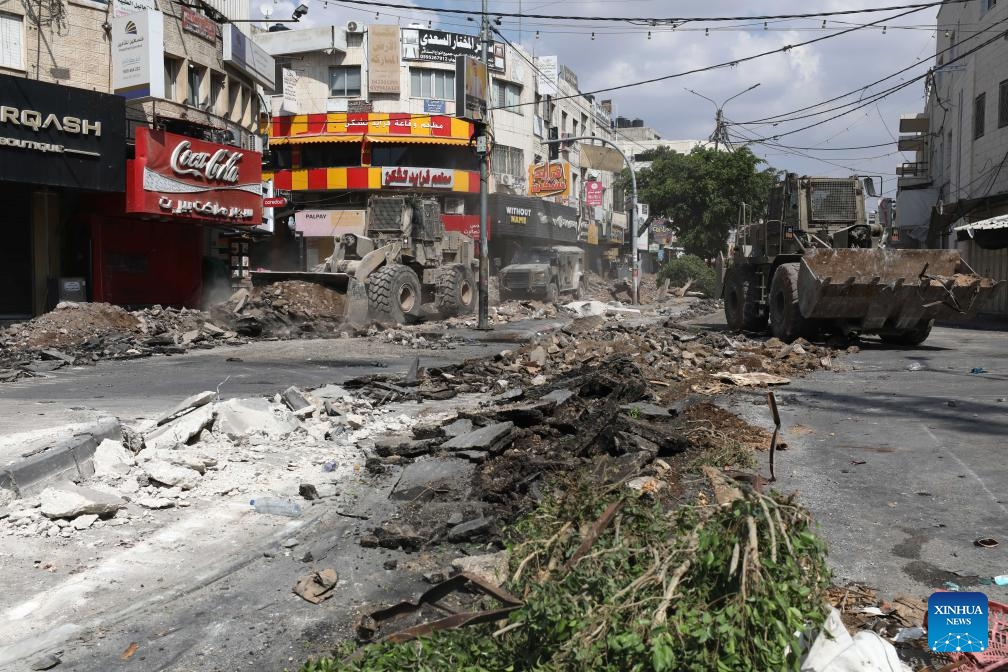 Israeli loaders destroy a road in the northern West Bank city of Jenin, on Sept. 2, 2024. The Israeli forces continued operation on Jenin and its camp for the sixth consecutive day on Monday, the Palestinian official news agency WAFA reported. WAFA said that the operation has caused widespread destruction of infrastructure, including water and electricity networks, as well as people's property. (Photo: Xinhua)