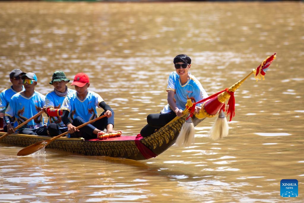 People participate in an annual dragon boat racing festival in Luang Prabang, Laos, Sept. 2, 2024. (Photo: Xinhua)