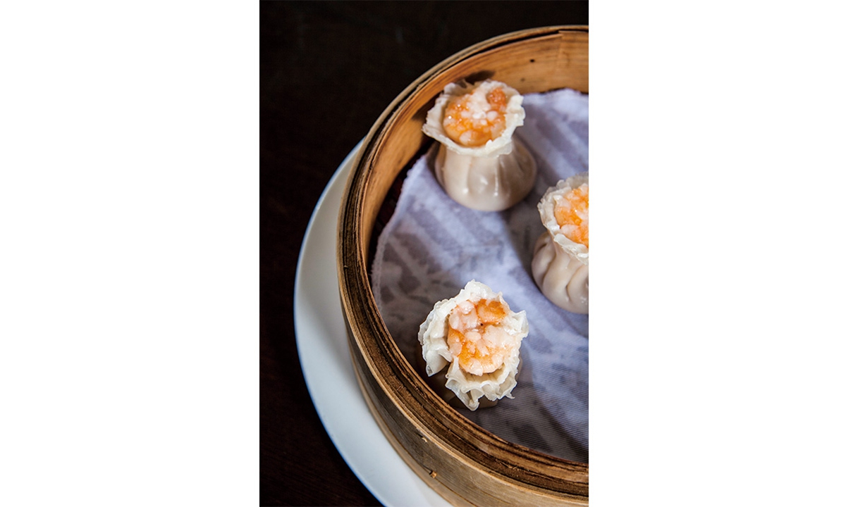 Employees prepare steamed soup dumplings at a Din Tai Fung restaurant in Xuhui district, Shanghai. Photo: VCG