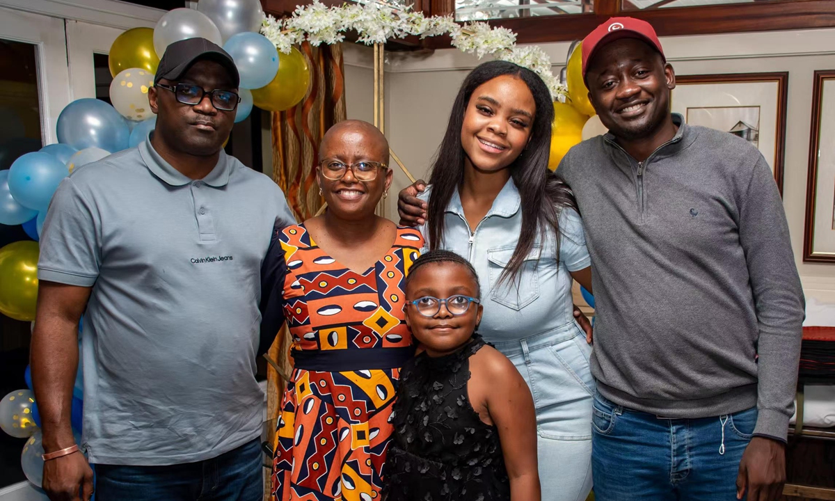 Angela Kapapilo (second from left) and her family have a group photo taken on June 15, 2024. Photo: Courtesy of Kapapilo 