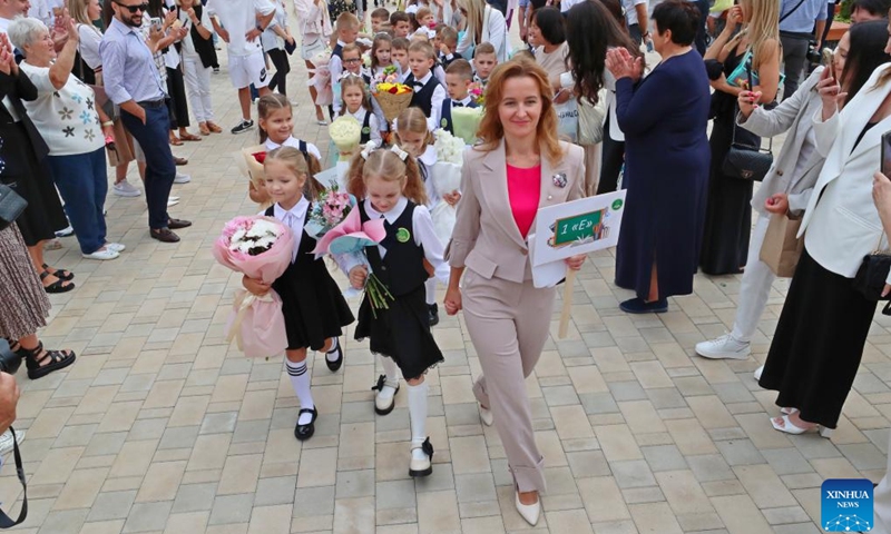 Primary school students attend the opening ceremony of the new school year in Minsk, Belarus, Sept. 2, 2024. (Photo: Xinhua)