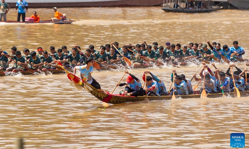 People participate in an annual dragon boat racing festival in Luang Prabang, Laos, Sept. 2, 2024. (Photo: Xinhua)