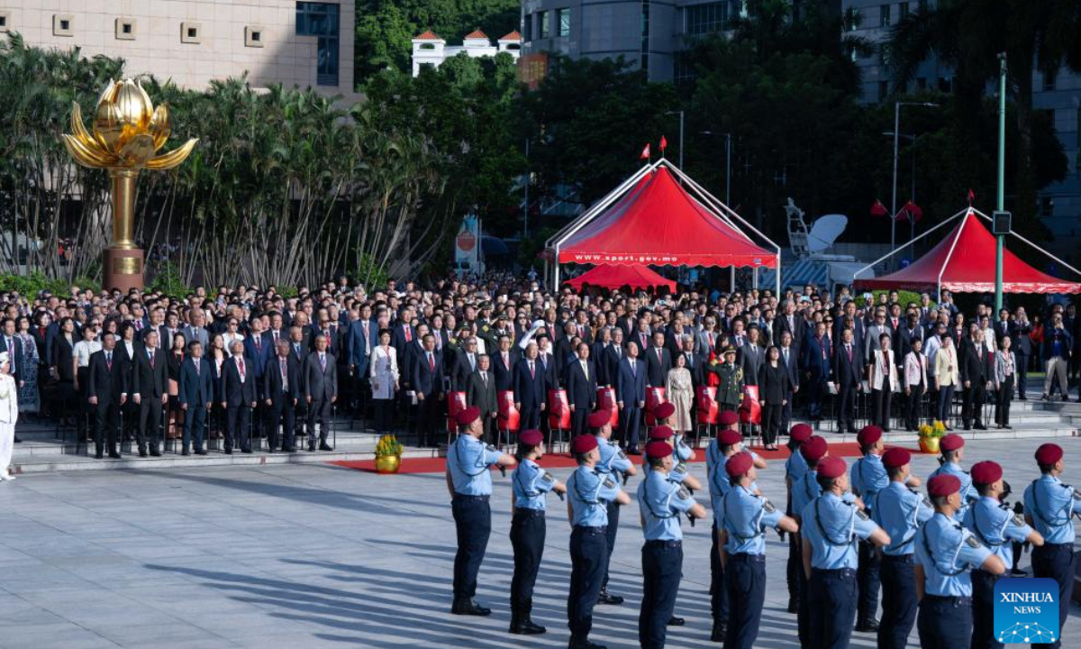 A flag-raising ceremony marking the 75th anniversary of the founding of the People's Republic of China is held in Macao, south China, Oct 1, 2024. Photo:Xinhua