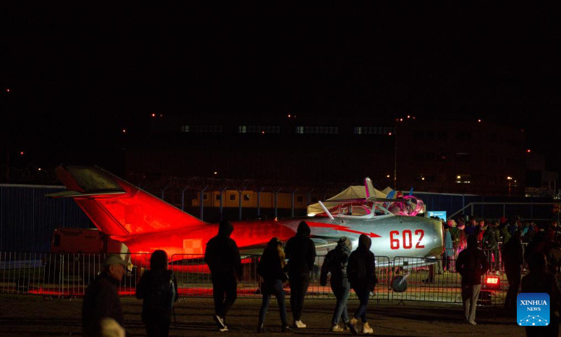 People visit the 13th Night at the Institute of Aviation in Warsaw, Poland on Oct. 4, 2024. This annual event, hosted by the Warsaw Institute of Aviation, is one of the largest educational night activities in the country, aimed at promoting knowledge and careers in aviation and engineering. (Photo by Jaap Arriens/Xinhua)