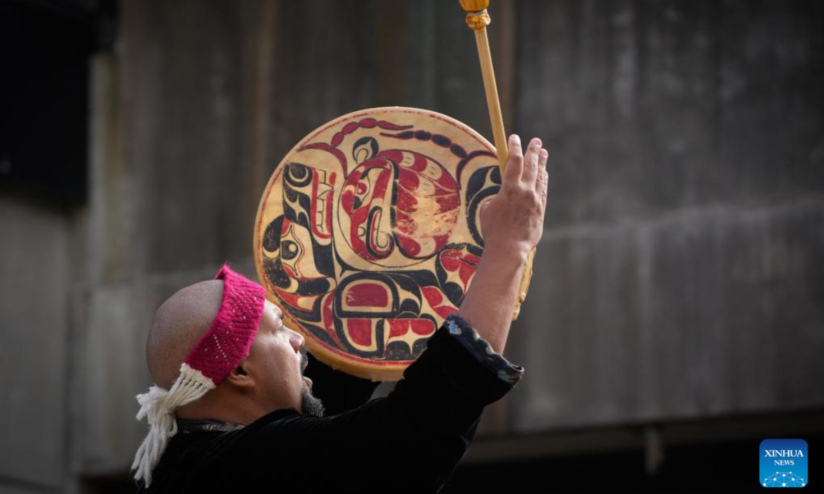 An indigenous singer performs during a ceremony marking the National Day for Truth and Reconciliation at the University of British Columbia in Vancouver, British Columbia, Canada, Sep 30, 2024. Photo:Xinhua