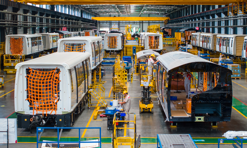 Workers manufacture driverless trains at a factory of CRRC Puzhen Alstom Transportation Systems Ltd Co in Wuhu, East China's Anhui Province, on September 19, 2024. In recent years, Wuhu has actively cultivated a rail transit industry chain cluster and vigorously promoted the high-quality development of the manufacturing industry by supporting digital, intelligent and green transformation. Photo: VCG