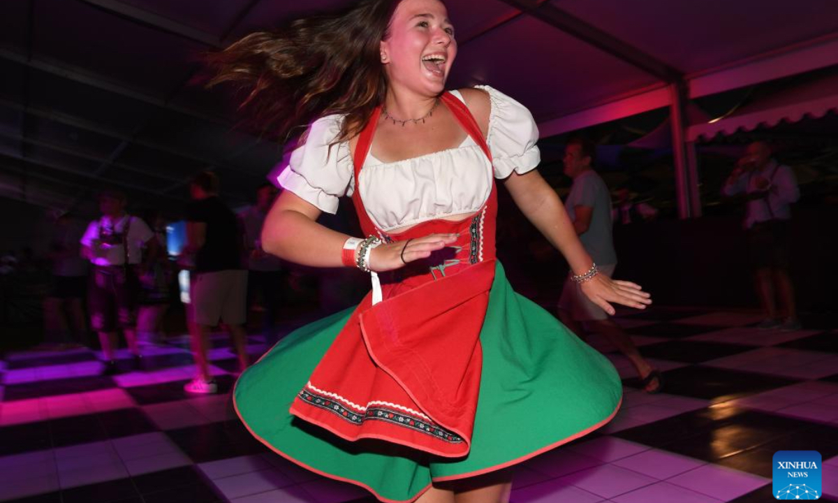 A woman dances at the Windhoek Oktoberfest in Windhoek, Namibia, Oct. 25, 2024. The 64th edition of the Windhoek Oktoberfest kicked off on Friday in the Namibian capital of Windhoek. (Photo: Xinhua)