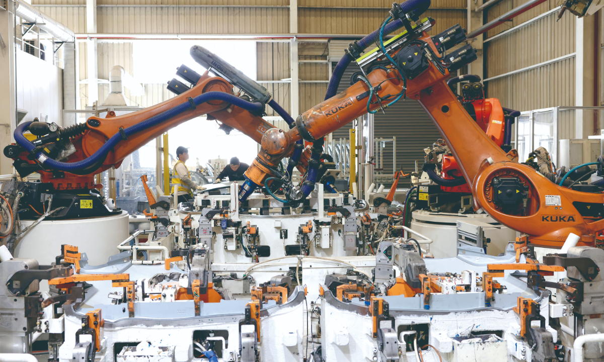 An intelligent production line of EV components in Fuzhou, East China's Fujian Province Photo:VCG