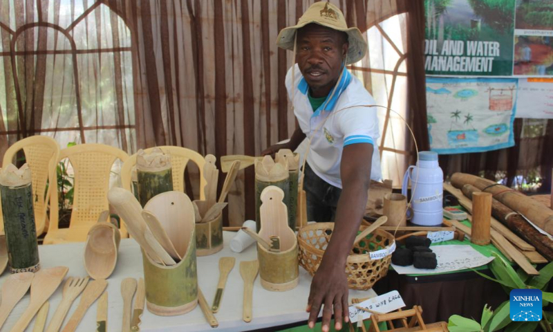 Edmond Machoki is pictured at his stand with bamboo products at an exhibition in Nyeri County, central Kenya, Sept. 13, 2024. (Photo by Robert Manyara/Xinhua)