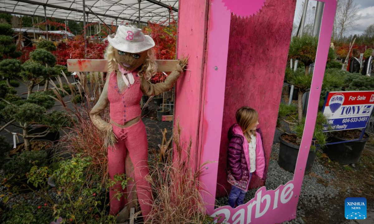 A Barbie themed scarecrow is displayed during the annual Art's Nursery Scarecrow Festival in Langley, British Columbia, Canada, Oct. 26, 2024. (Photo: Xinhua)