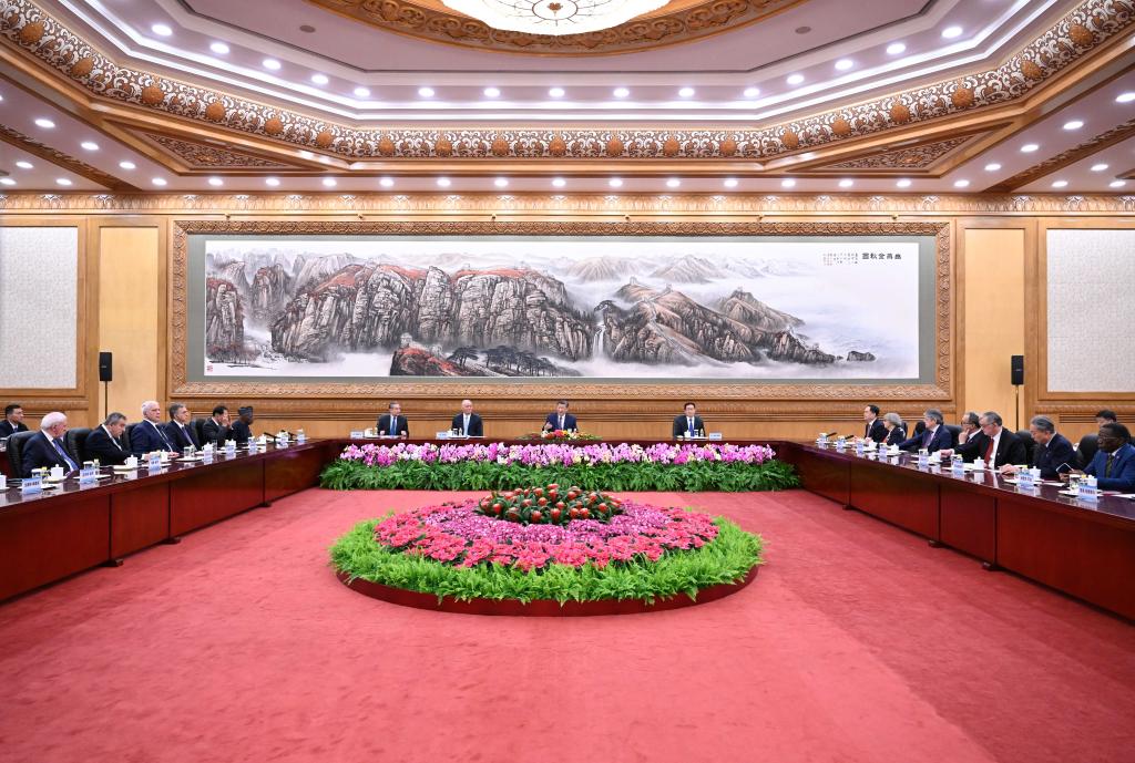 Chinese President Xi Jinping meets with foreign guests attending the China International Friendship Conference and conference marking the 70th founding anniversary of the Chinese People's Association for Friendship with Foreign Countries at the Great Hall of the People in Beijing, capital of China, Oct 11, 2024. Photo:Xinhua