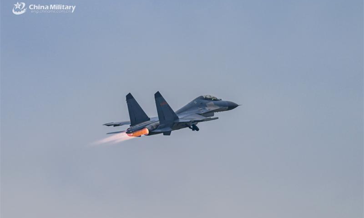 A fighter jet attached to an aviation regiment under the Chinese PLA Air Force takes off for an air battle training exercise in early July, 2024. Photo:China Military