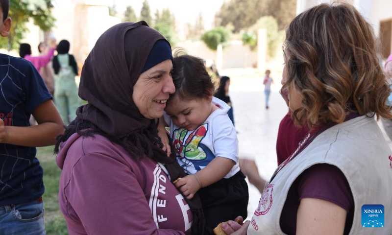 Lebanese take refuge at a monastery in Syria's central Homs province, Oct. 2, 2024. (Photo by Monsef Memari/Xinhua)