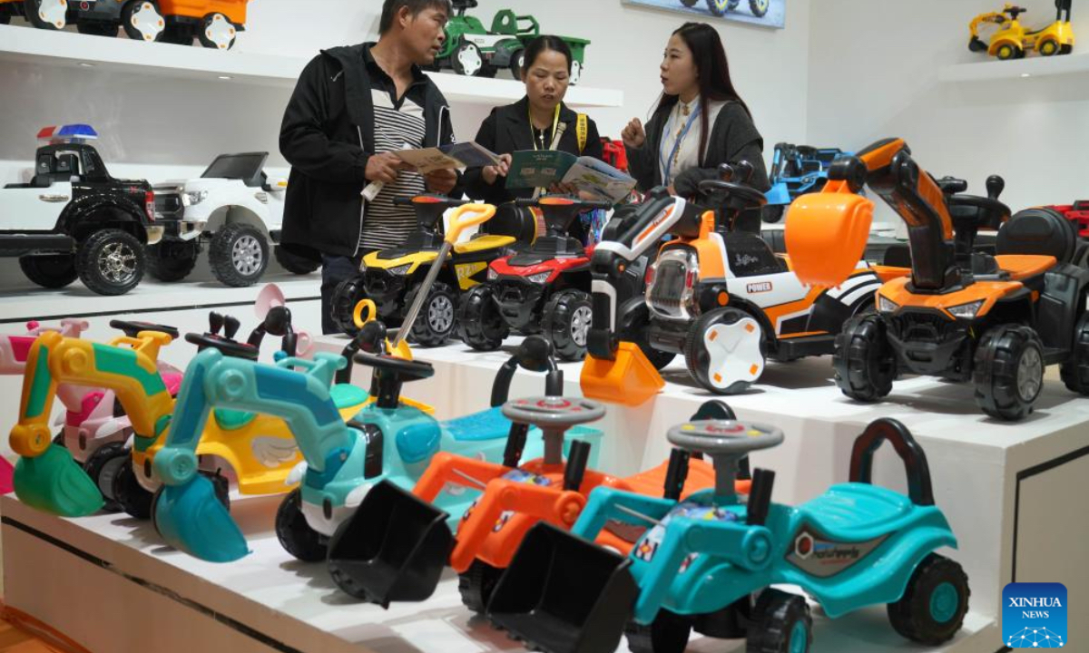 Merchants visit the 18th International Bicycles, Baby Strollers and Toys Fair in Pingxiang County, north China's Hebei Province, Oct. 26, 2024. The fair opened here on Saturday, with more than 3,000 booths and attracting merchants from over 80 countries and regions. Pingxiang of Hebei Province is renowned for its industry of bicycles, baby strollers and toys. (Photo: Xinhua)