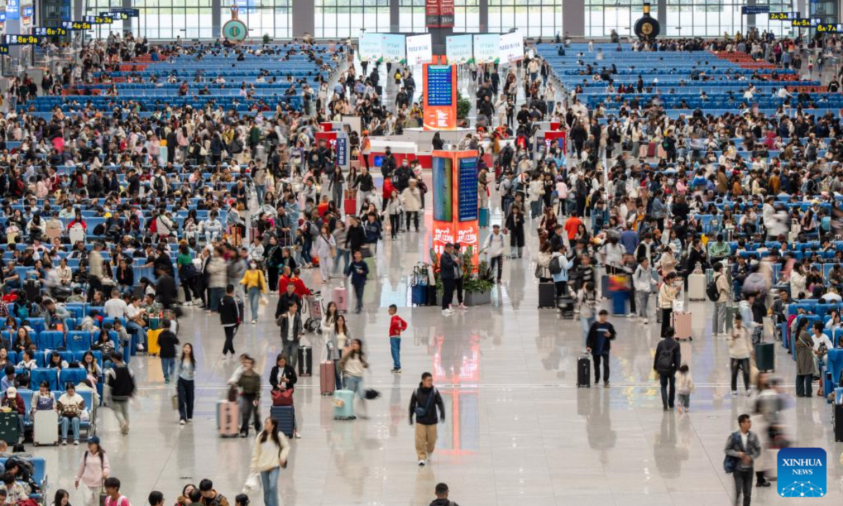 Passengers are seen at a waiting hall of Guiyang North Railway Station in Guiyang, southwest China's Guizhou Province, Oct 1, 2024. Tuesday marks the first day of China's National Day holiday. China is expected to see 175 million railway trips during the 10-day travel rush, which runs from Sep 29 to Oct 8, according to China State Railway Group Co., Ltd. Photo:Xinhua