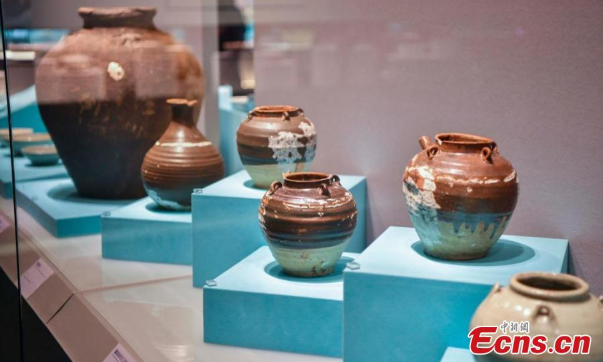 People visit an exhibition featuring relics retrieved from two ancient shipwrecks discovered in the South China Sea at the China (Hainan) Museum of the South China Sea in Qionghai, south China's Hainan Province, Sep 27, 2024. Photo:China News Service