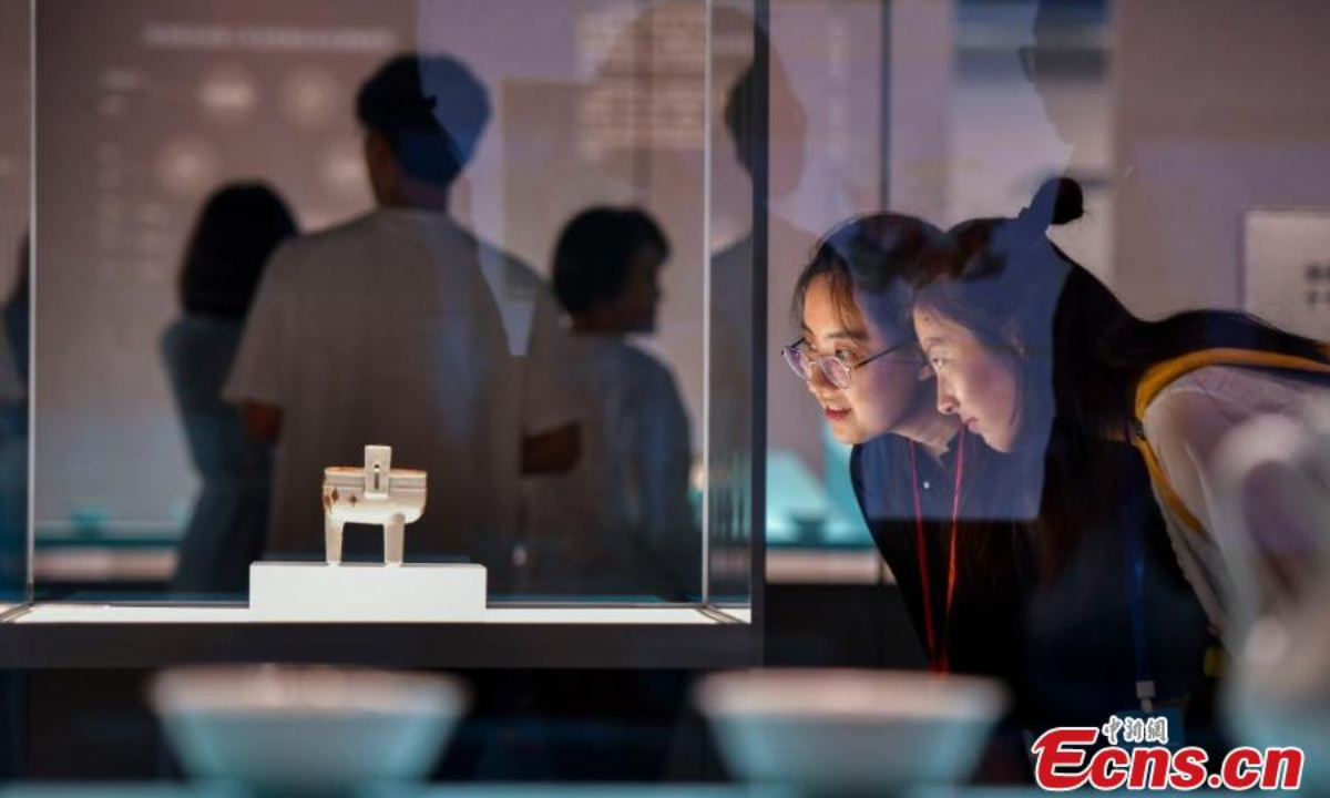 People visit an exhibition featuring relics retrieved from two ancient shipwrecks discovered in the South China Sea at the China (Hainan) Museum of the South China Sea in Qionghai, south China's Hainan Province, Sep 27, 2024. Photo:China News Service