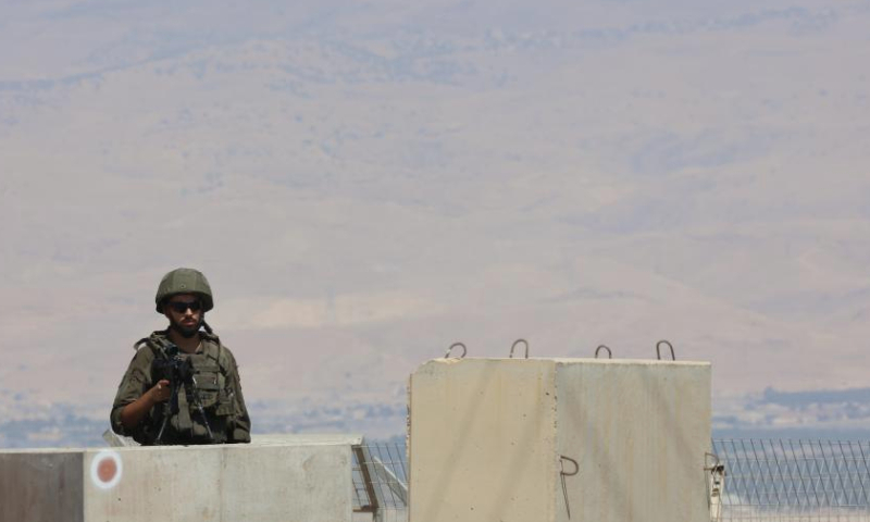 A member of Israeli security forces stands guard at the Allenby Bridge, a border point between Jordan and the occupied West Bank on Sept. 8, 2024. (Photo by Gil Cohen Magen/Xinhua)