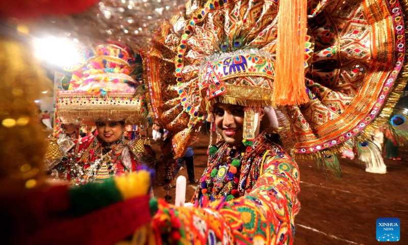 Hindu devotees perform the Garba dance during the Navratri festival in Bhopal, the capital of India's Madhya Pradesh state, Oct. 4, 2024. (Str/Xinhua)