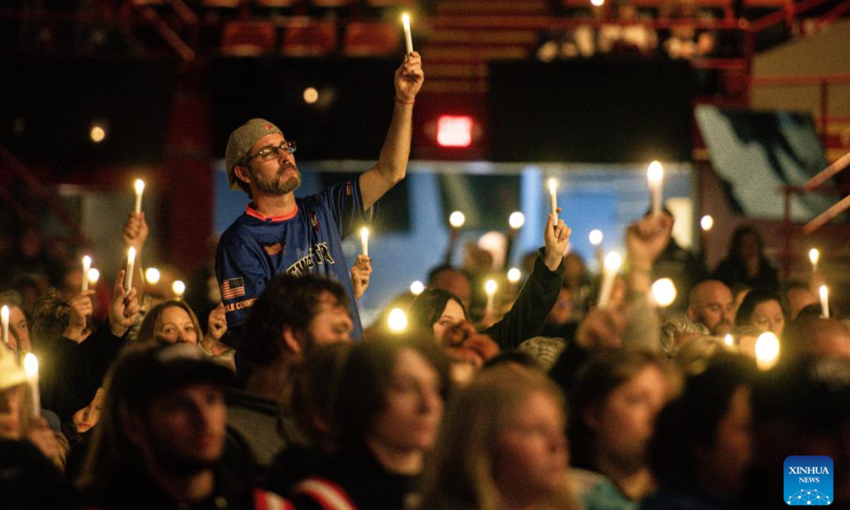 A candlelight vigil is held to mourn Lewiston shooting victims in Lewiston, Maine, the United States on Oct. 25, 2024. This Friday marks the one year anniversary of the mass shooting in Lewison back in 2023. As many as 18 people were killed and 13 injured in the mass shooting. (Photo: Xinhua)