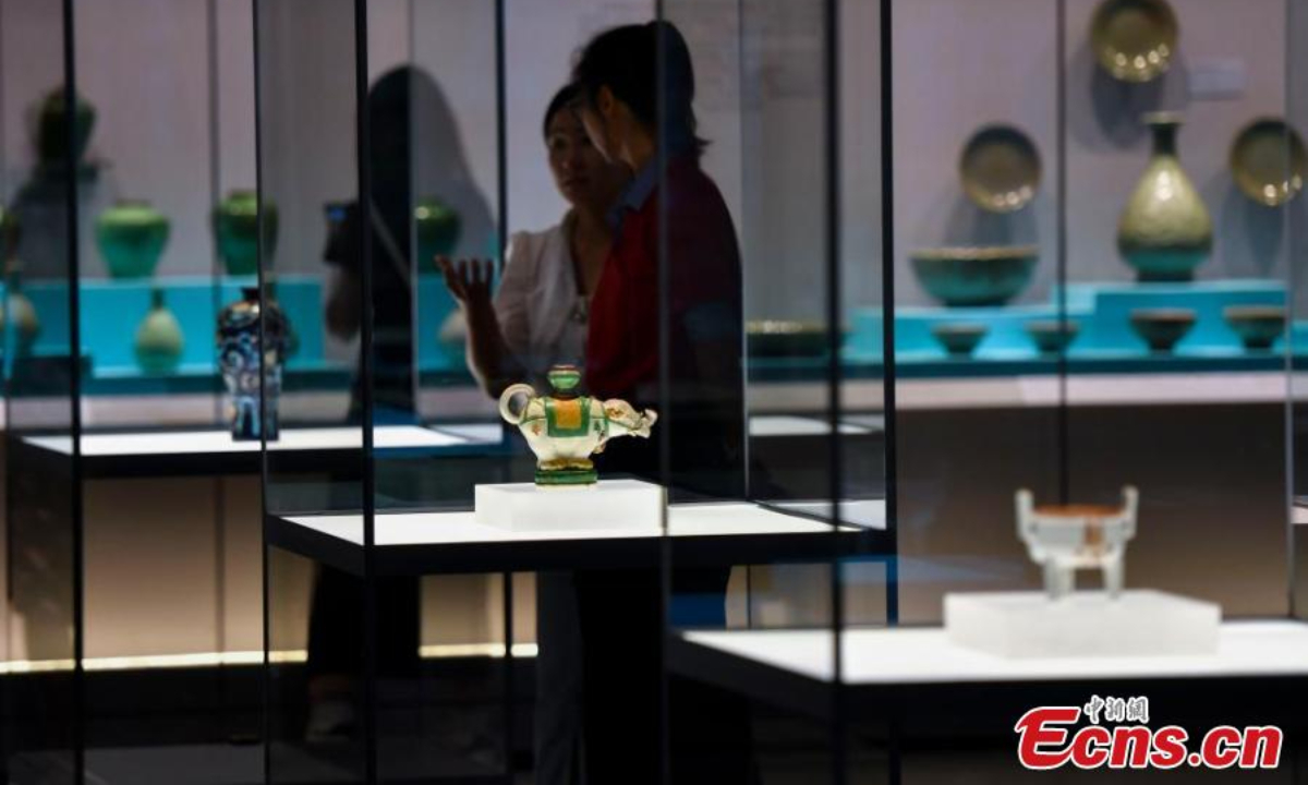 People visit an exhibition featuring relics retrieved from two ancient shipwrecks discovered in the South China Sea at the China (Hainan) Museum of the South China Sea in Qionghai, south China's Hainan Province, Sep 27, 2024. Photo:China News Service