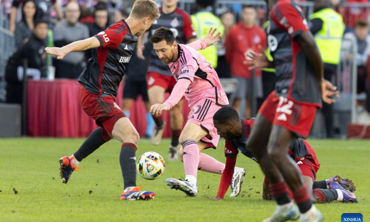 Lionel Messi (C) of Inter Miami CF vies for the ball during the 2024 Major League Soccer(MLS) match between Toronto FC and Inter Miami CF at BMO Field in Toronto, Canada, on Oct. 5, 2024. (Photo: Xinhua)