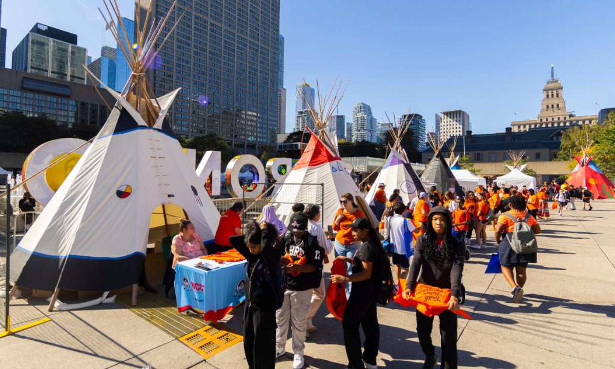 People participate in an event marking the National Day for Truth and Reconciliation in Toronto, Canada, Sep 30, 2024. Photo:Xinhua