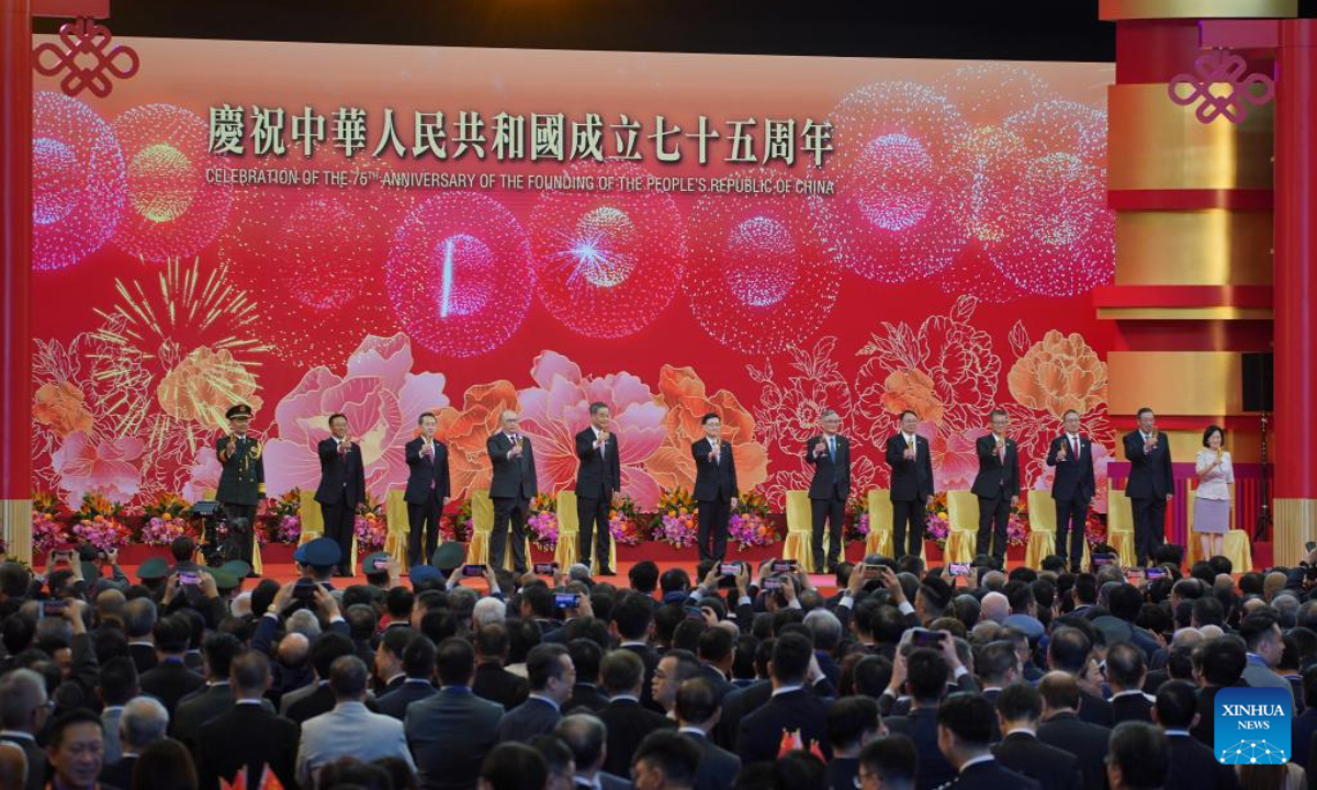 The Hong Kong Special Administrative Region (HKSAR) government holds a flag-raising ceremony and a reception to celebrate the 75th anniversary of the founding of the People's Republic of China in Hong Kong, south China, Oct 1, 2024. Photo:Xinhua